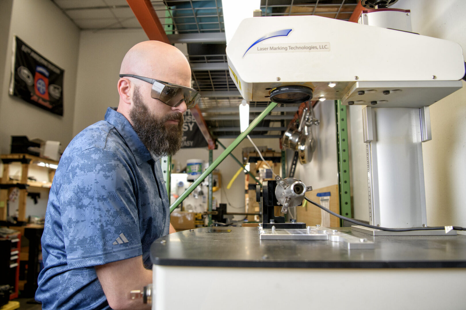 Laser engraving prototype firearm components for identification and permanent markings